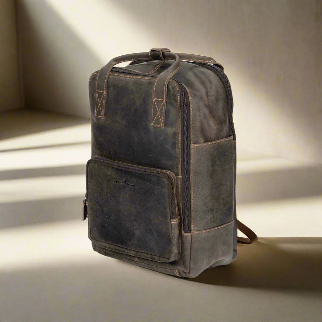 Stylish leather backpack showcased in a softly lit environment, ideal for everyday use and travel.