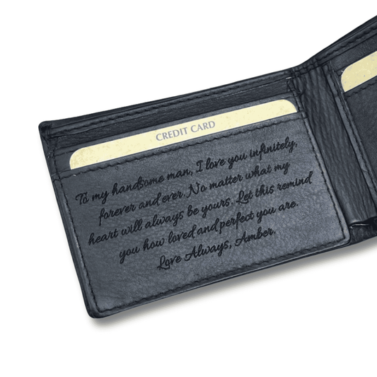 Black leather wallet with personalised message engraved.